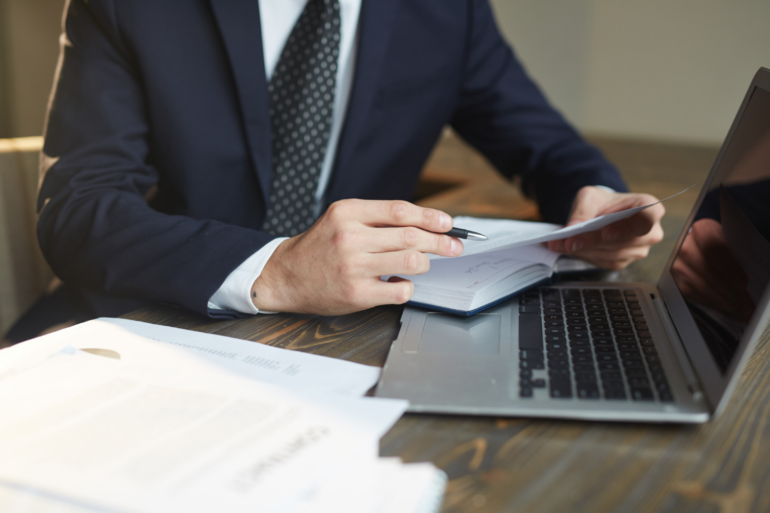 Businessman working with Pinterest scraping documentation